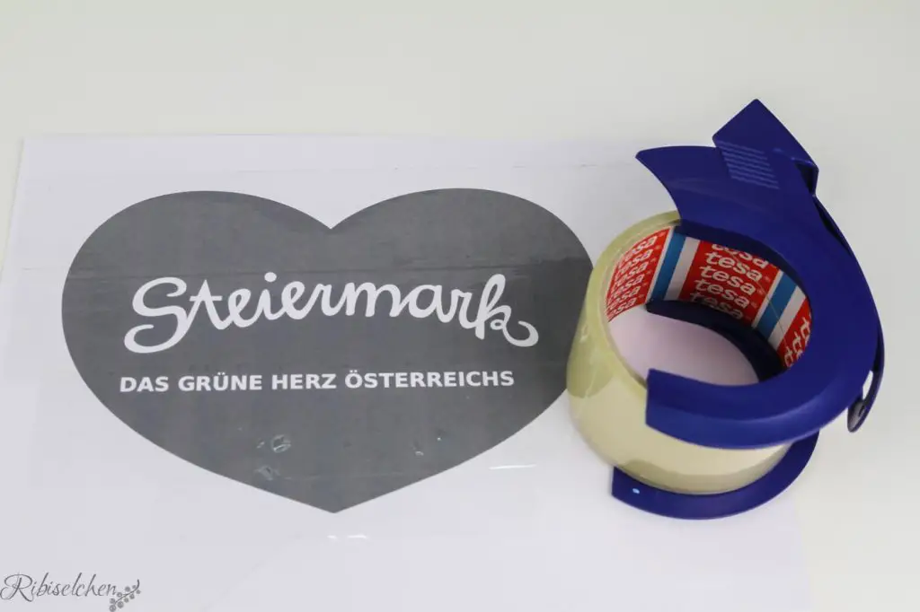 ausgedrucktes Steiermark Herz mit Paketklebeband